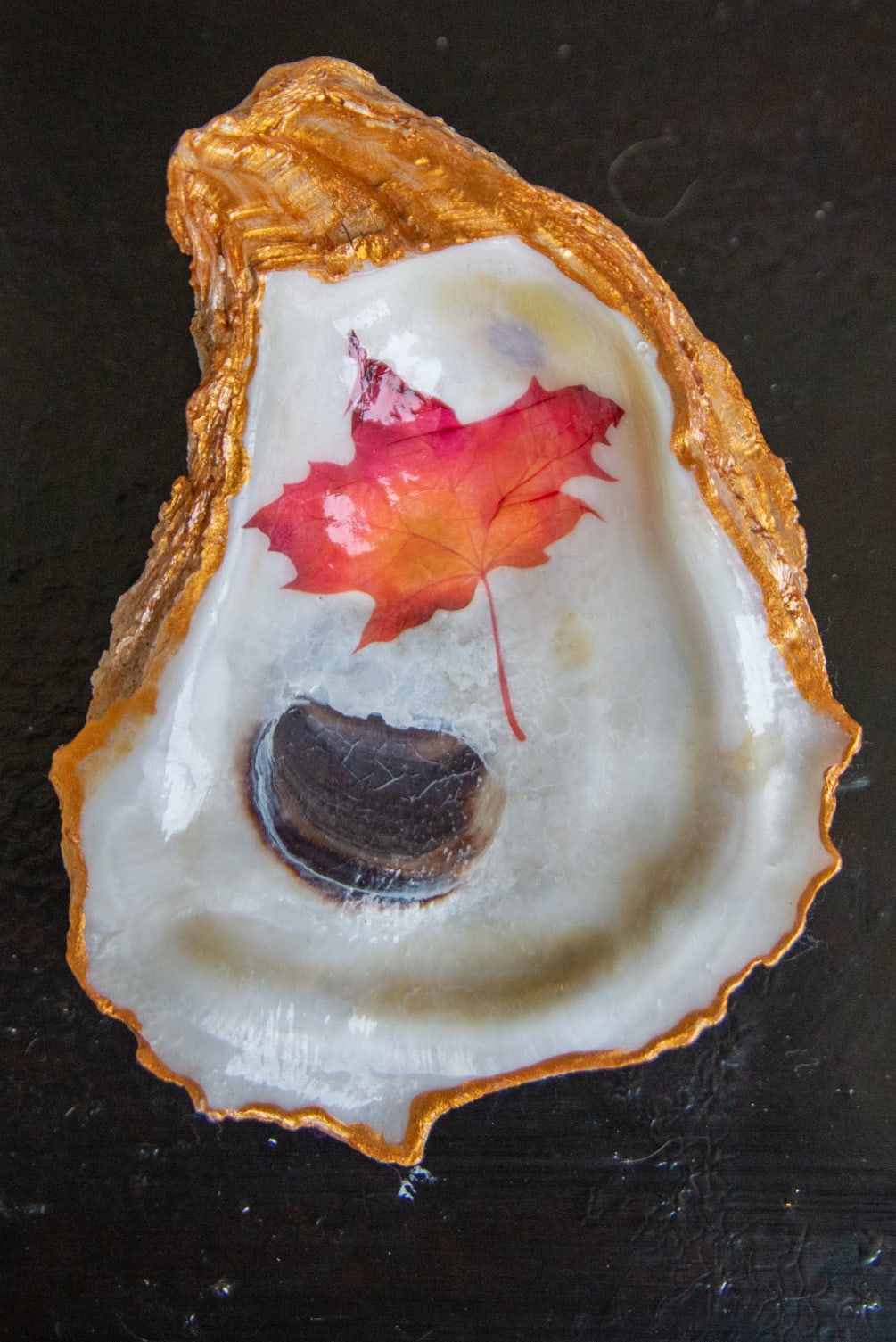 Real oysters that are collected here in the Lowcountry and hand decorated.