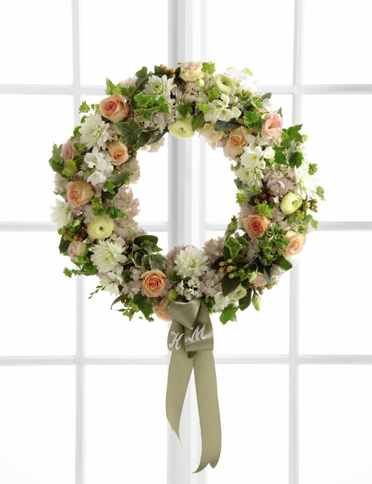 The FTD&Acirc;&reg; Garden Splendor&acirc;&cent; Wreath will bring a sweet grace to your