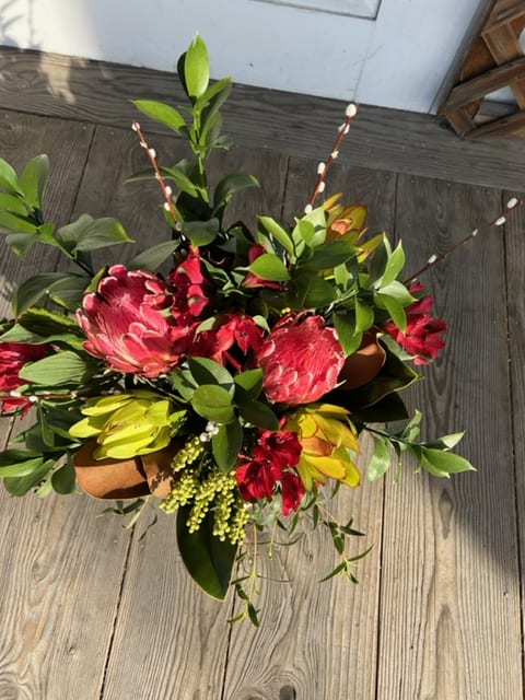 A truly unique combination of long-lasting flowers--2 types of protea, accented with
