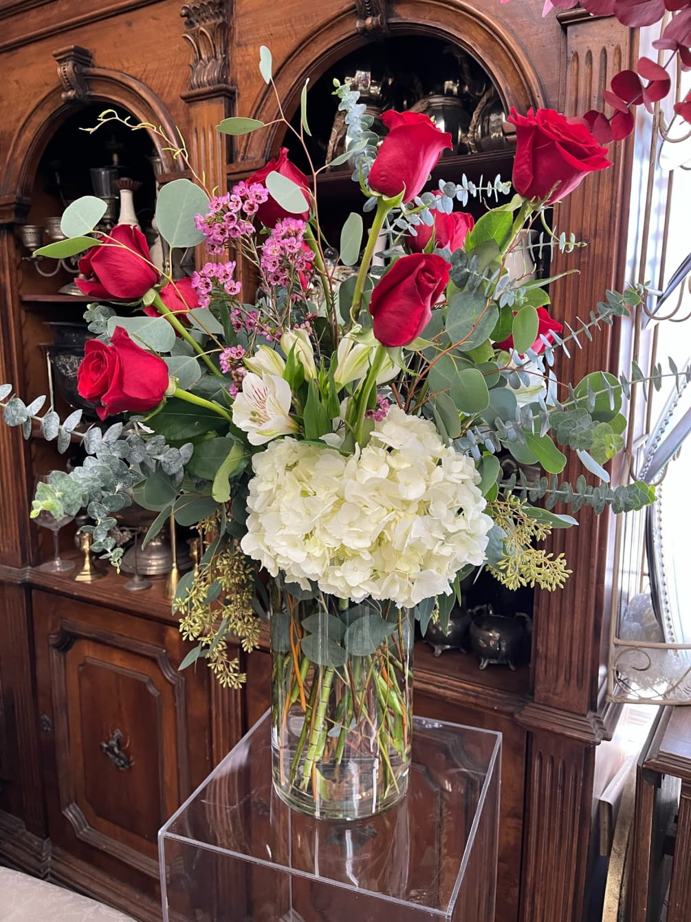 Stunning Rose arrangement featuring roses in any colored desired (hot pink shown