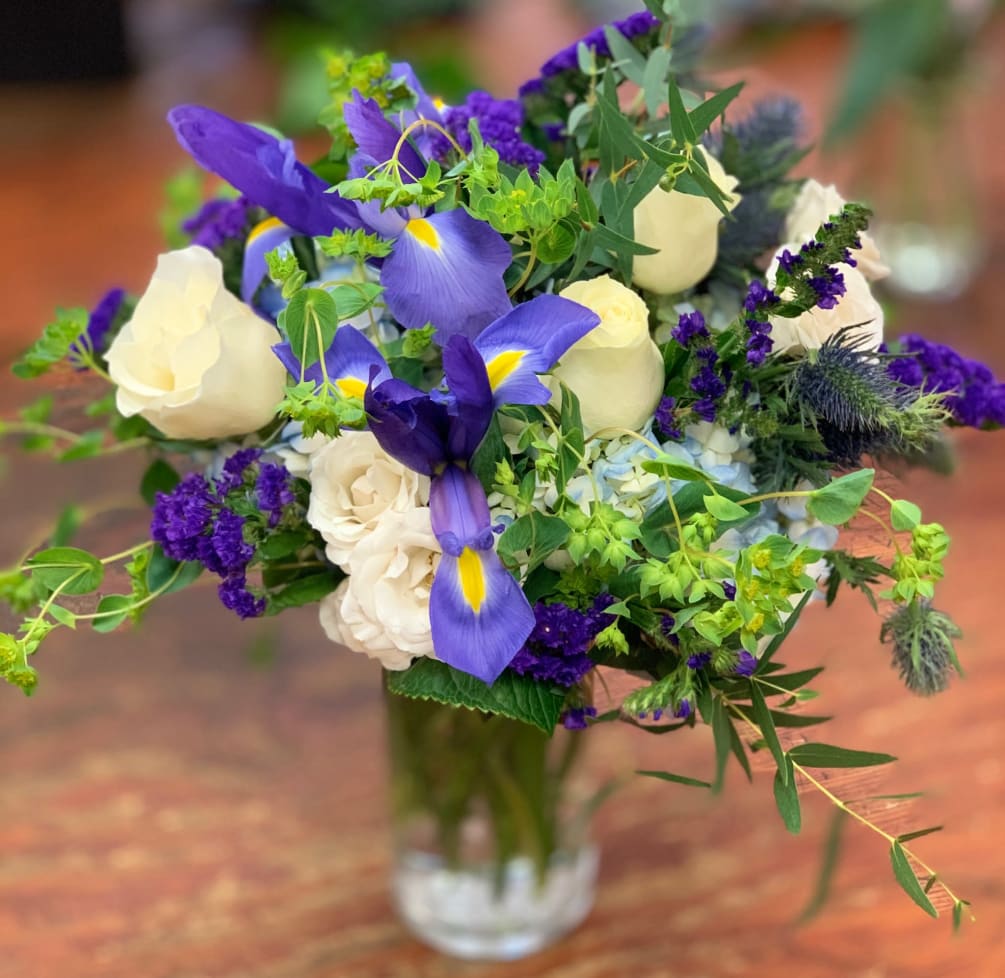 Blue Irises, Blue Hydrangeas, White Roses, Green Bluperium, Blue Sea Holly all