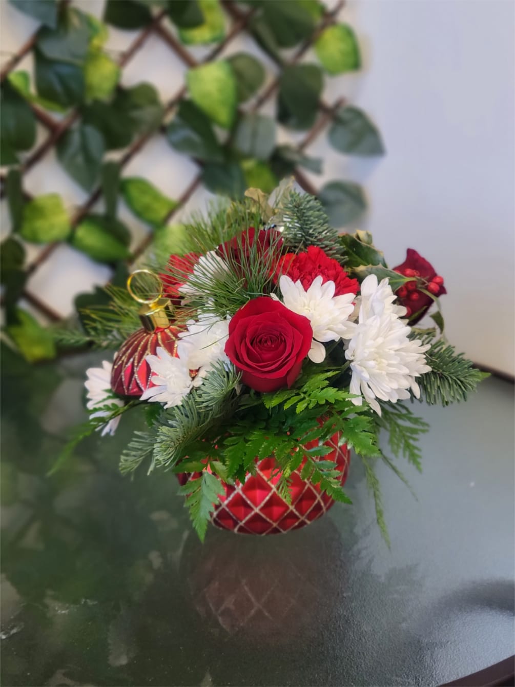 Beautiful Christmas arrangement with a variety of flowers of the occasion

Similar colors