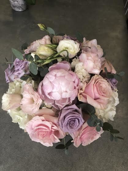 Soft pastel colors like pink and lavender. Some of the flowers might