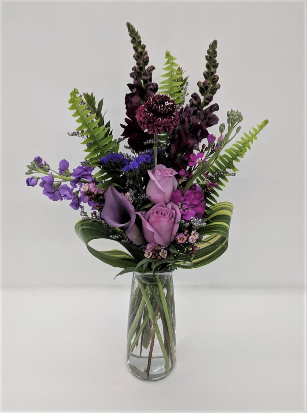 All shades of purple in this simple and elegant arrangement for the