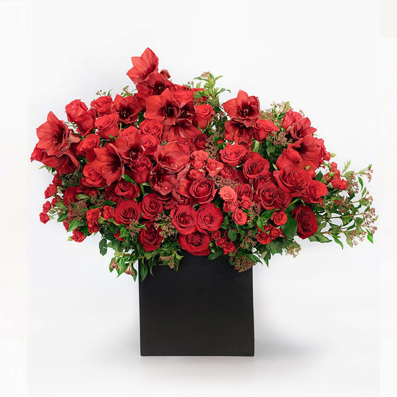 Romance is embodied in the Roses Galore arrangement. A sultry mix of
