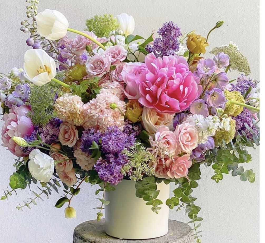 Something super sweet about summer, The arrangement will use all seasonal flowers.