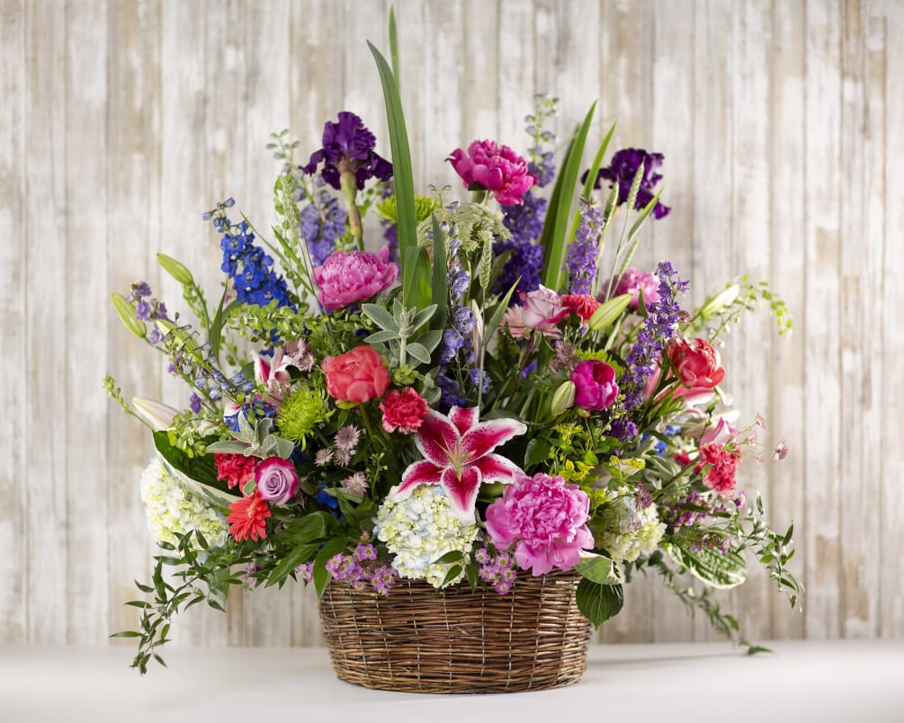 Our designers will create a beautiful garden arrangement of fresh flowers and
