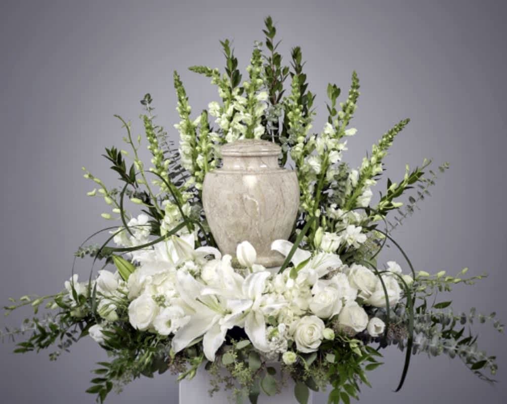 A combination of white blooms to celebrate the life of your loved