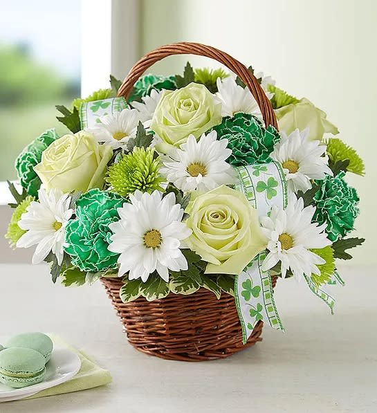 Green roses, pom white daisies and dyed green carnations arranged in a
