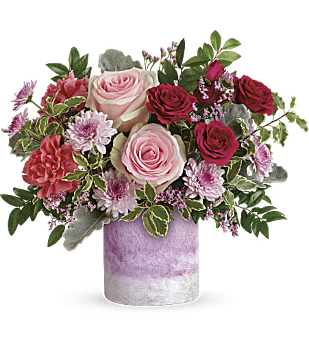 Pink roses, dark pink spray roses, pink carnations, lavender cushion spray chrysanthemums