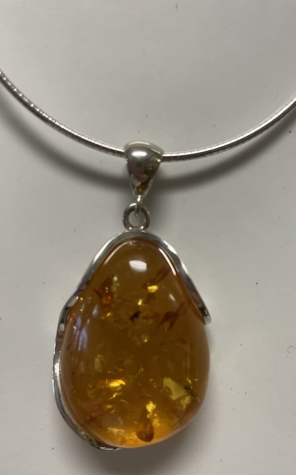 This is a really beautiful piece of amber that has been set