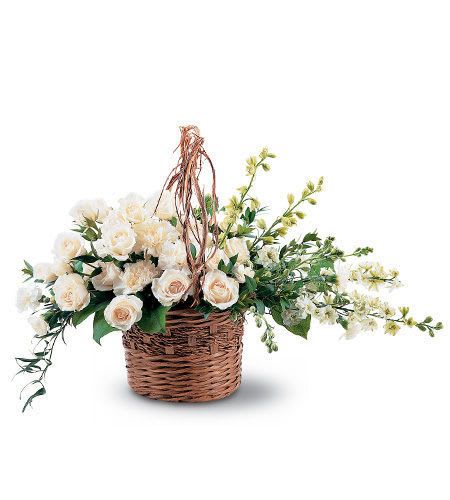 Our white elegant basket is artistically designed inside a keepsake willow basket