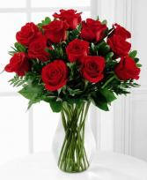 This vase of brilliant red roses is an elegant and natural way