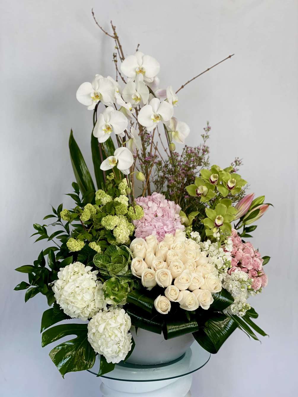 White Phalaenopsis Orchids, Green Cymbidium Orchids, White Roses, Pink Hydrangea, White Hydrangea