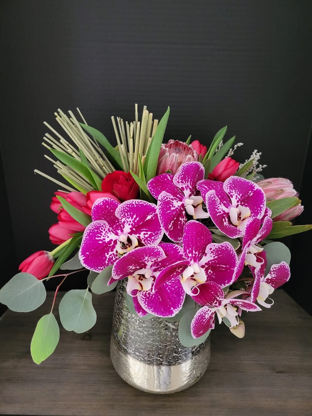 Phalaenopsis, Tulips, Protea, Roses