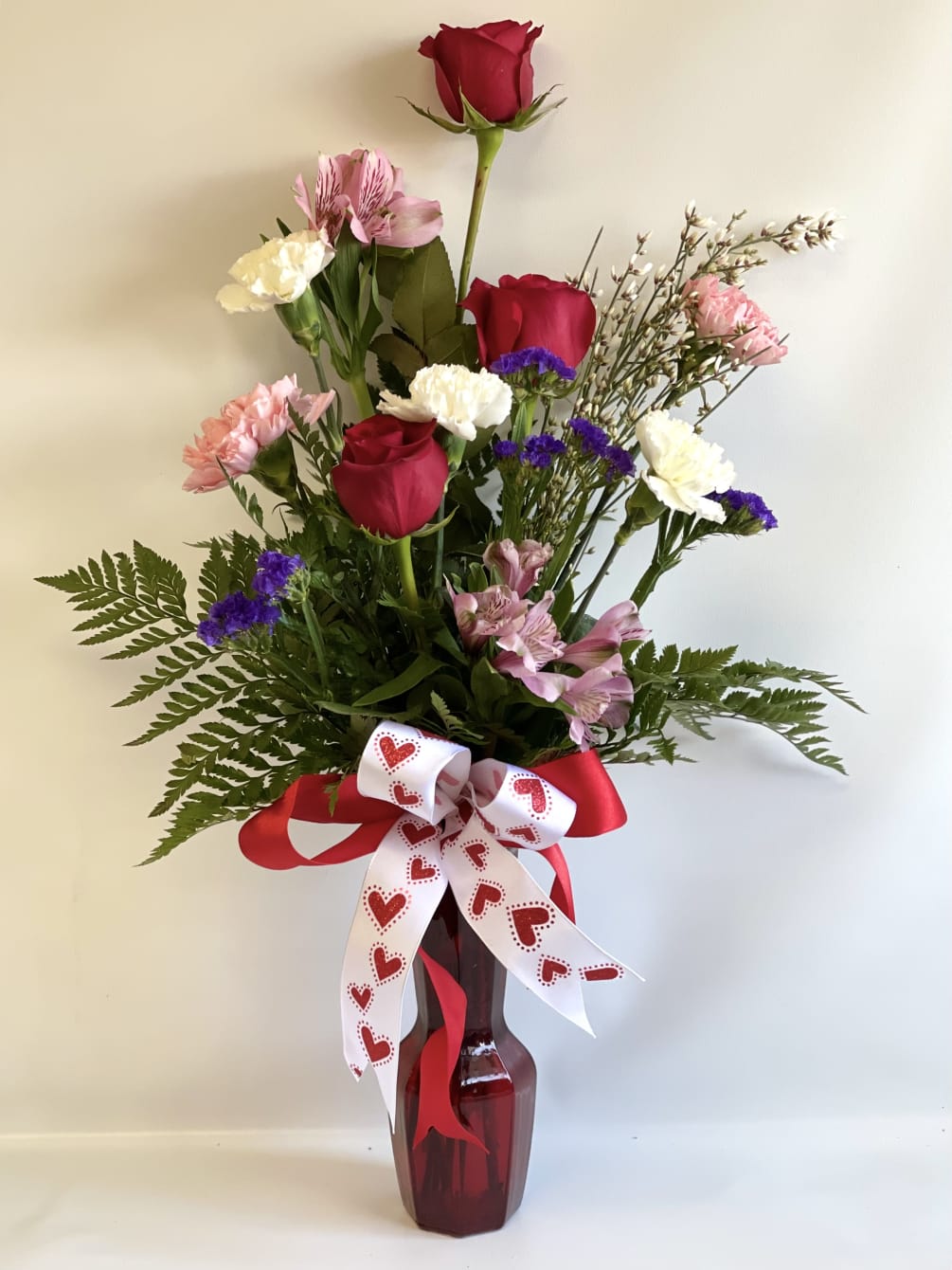 Just like hugs and kisses.. this bouquet will bring a smile to
