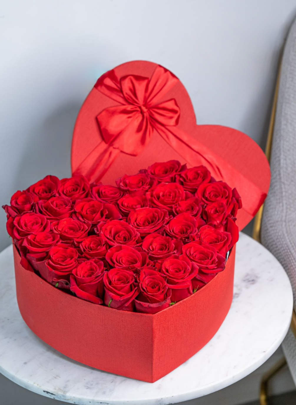 Flowers in a box is a romantic gift for any celebration. Such