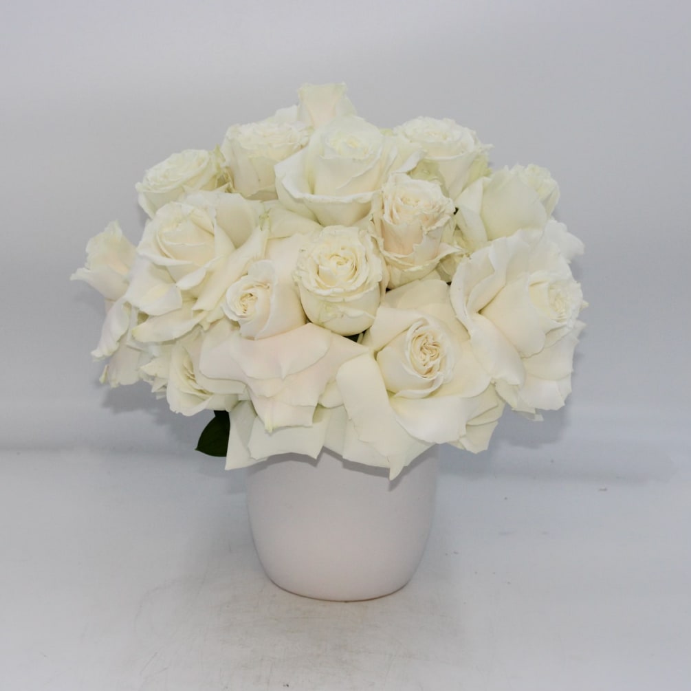 Elegant, chic and luxurious, Breathtaking is a truly stunning arrangement. Premium White