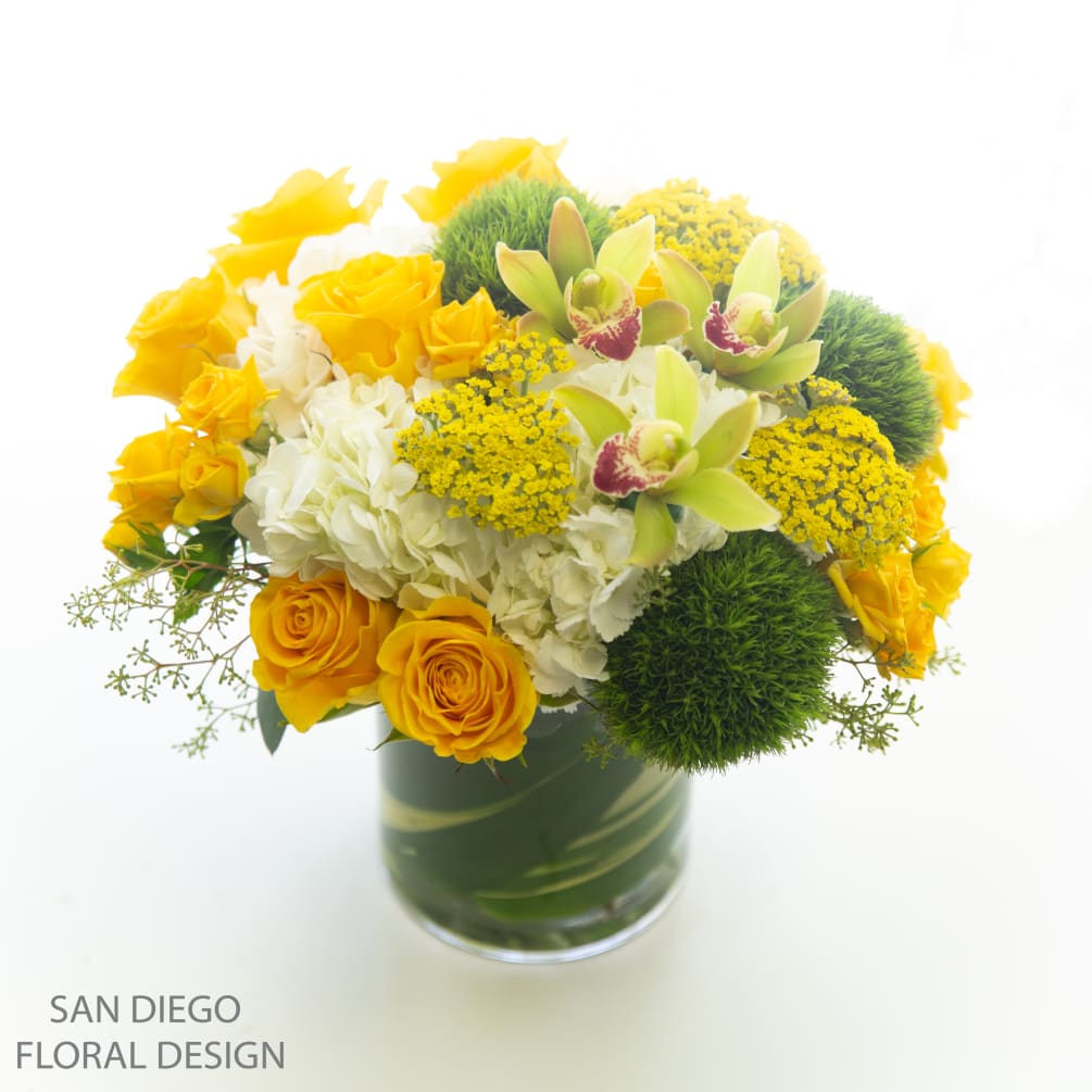 Fun and bright arrangement inspired by the warm Southern California sun. 