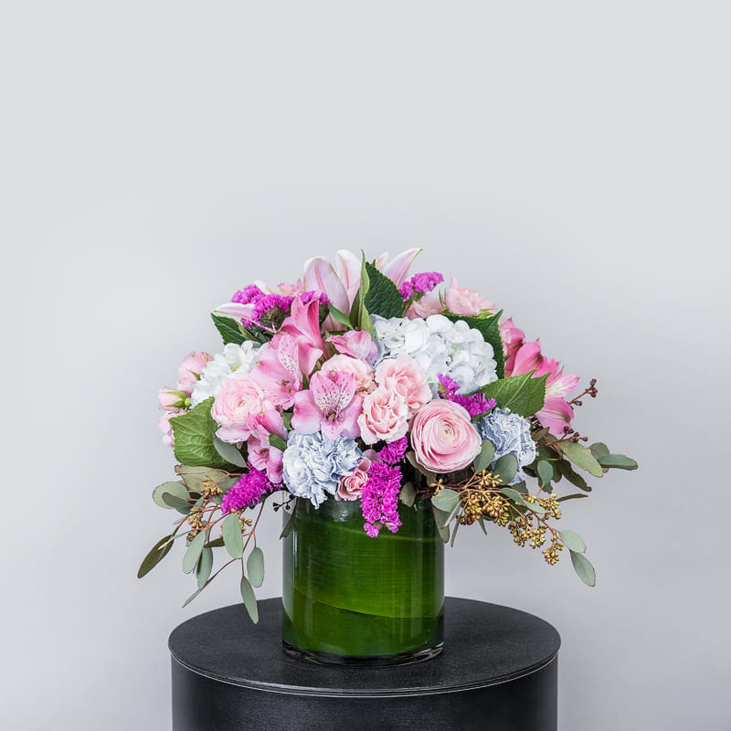 Perfect for every anniversary or birthday, this compact arrangement proves the elegance