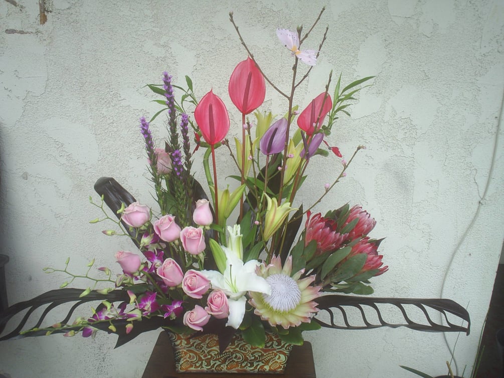 protea ,anthirium,lily,roses and orchids