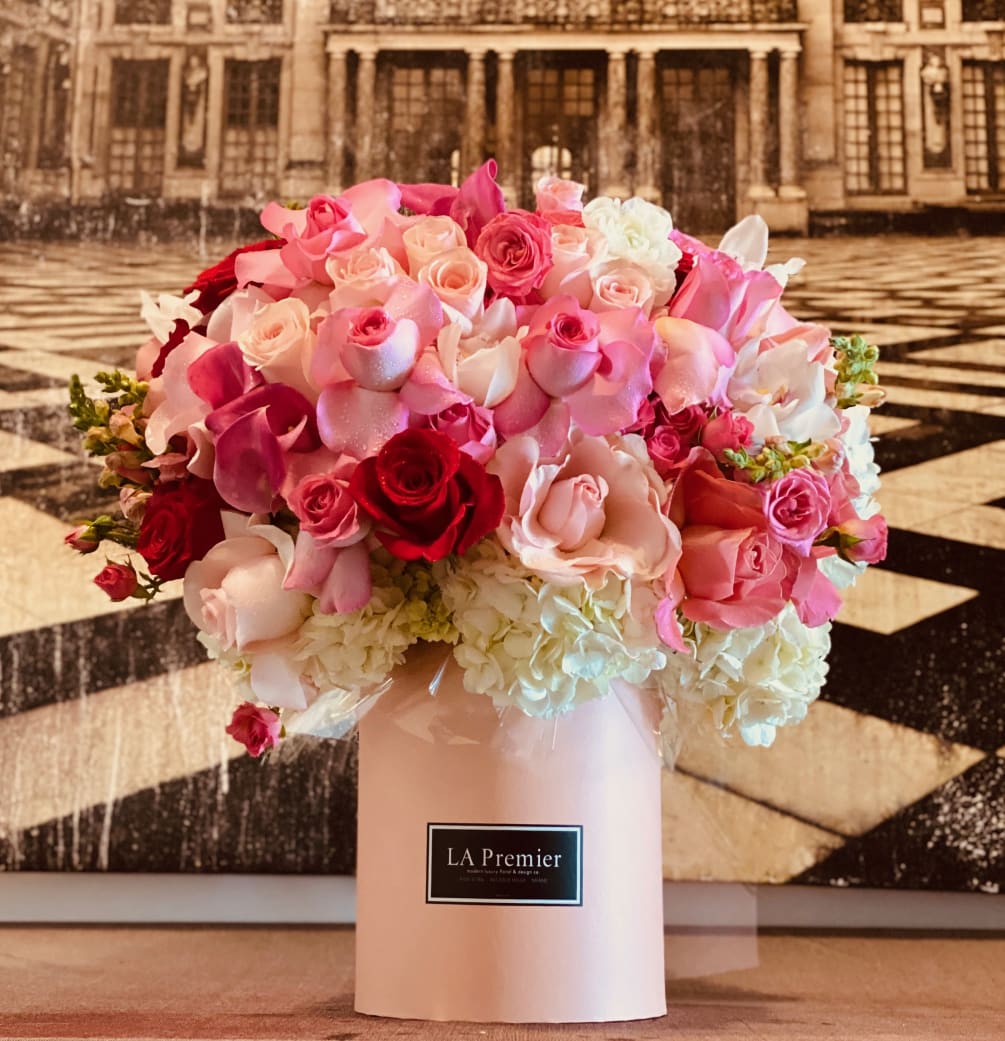 This 10&quot; hat box is bursting with beautiful flowers in different shades