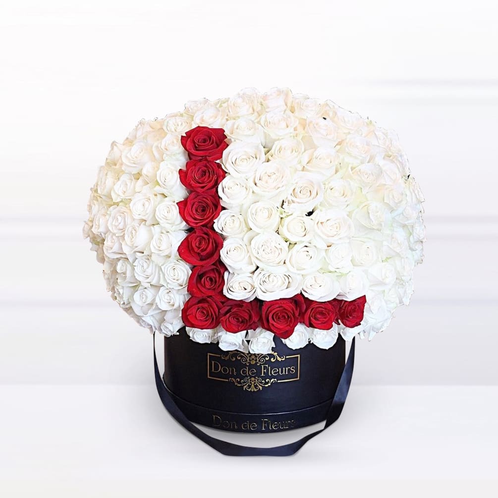 Our classic box arrangement features beautifully unique roses that are each handpicked