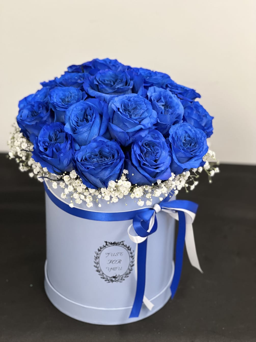 A box of 25 blue roses