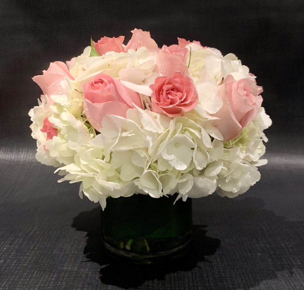 Custom Arrangement of Hydrangea &amp; roses in clear glass cylinder with leaf