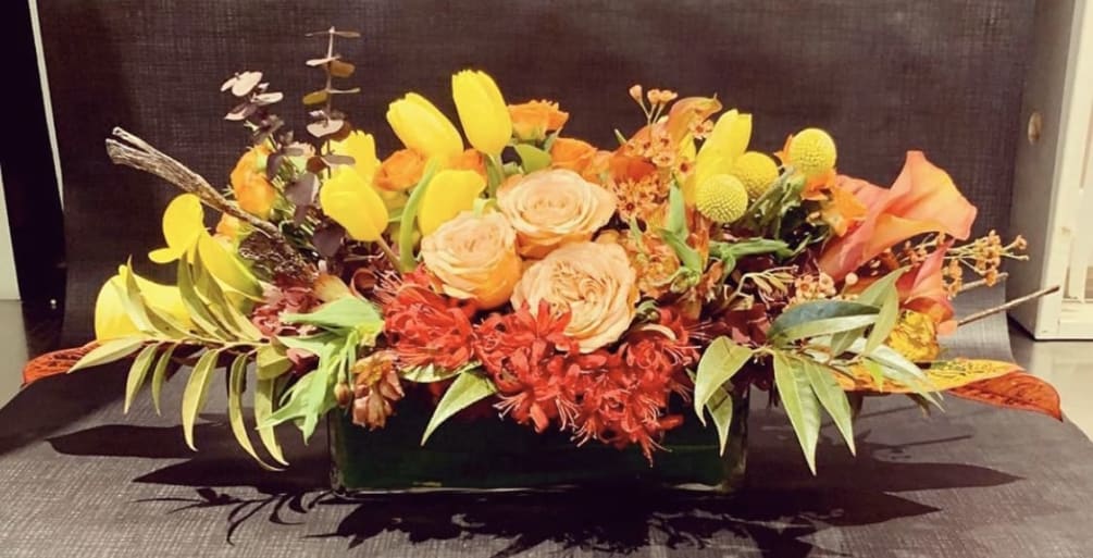 Custom arrangement of tulips, spray roses, calla lilies, roses, nerine lilies &amp;