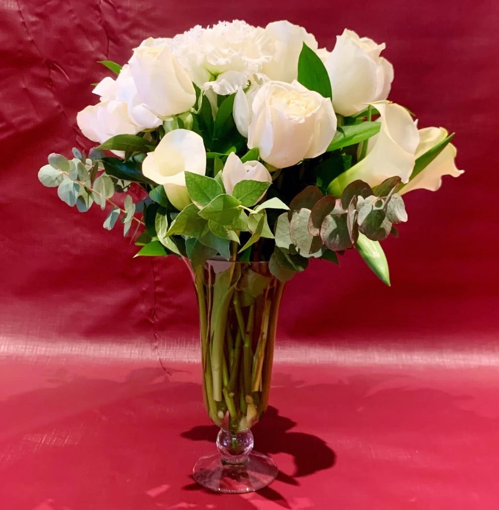 Custom arrangement of white roses, white peonies, white calla lilies, white tulips
