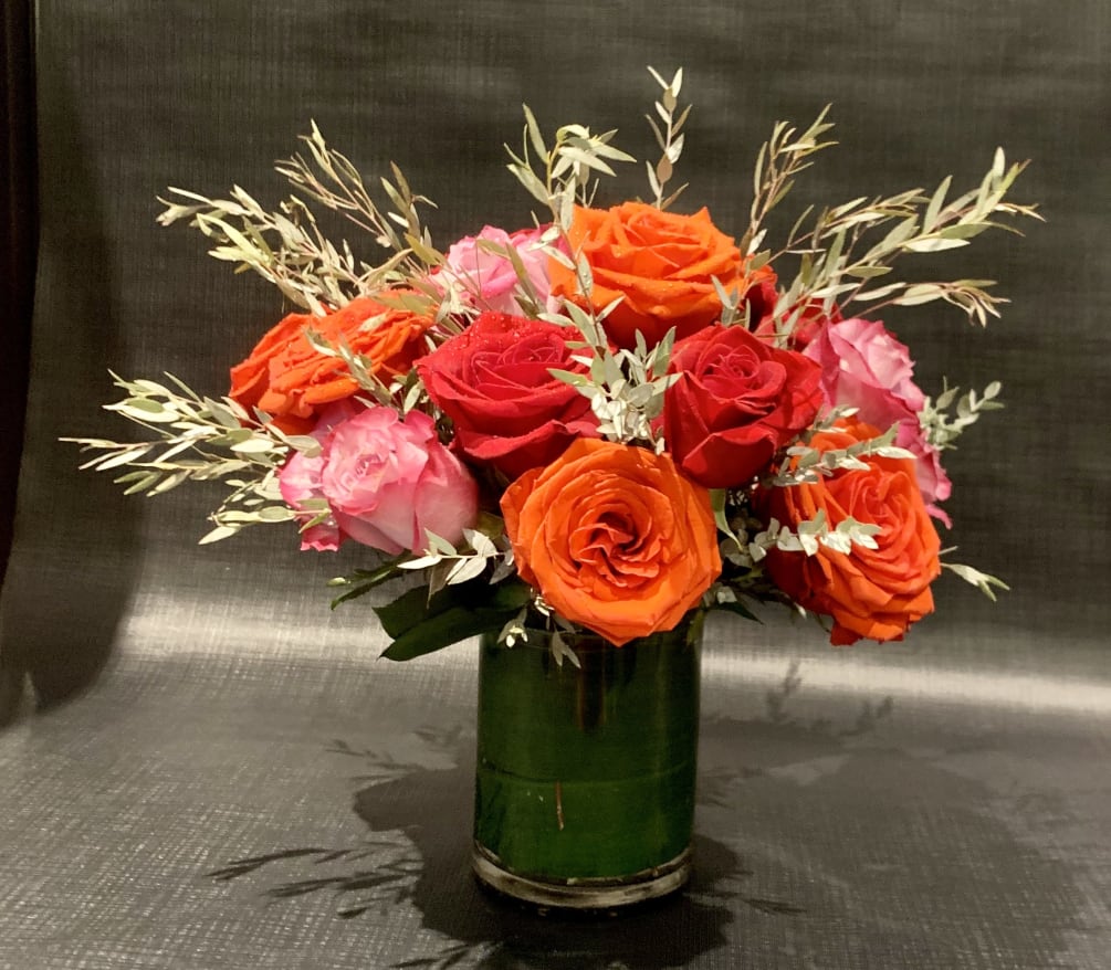 Custom Arrangement of red roses, pink roses &amp; orange roses in clear
