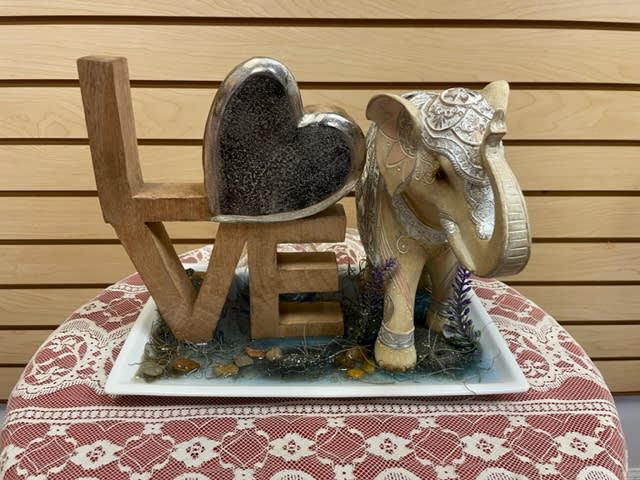 Wooden Love&#039;s Bedrock w/Cream Elephant on a tray