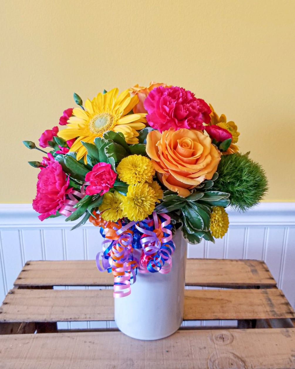 This colorful bouquet is the perfect way to celebrate a special day.