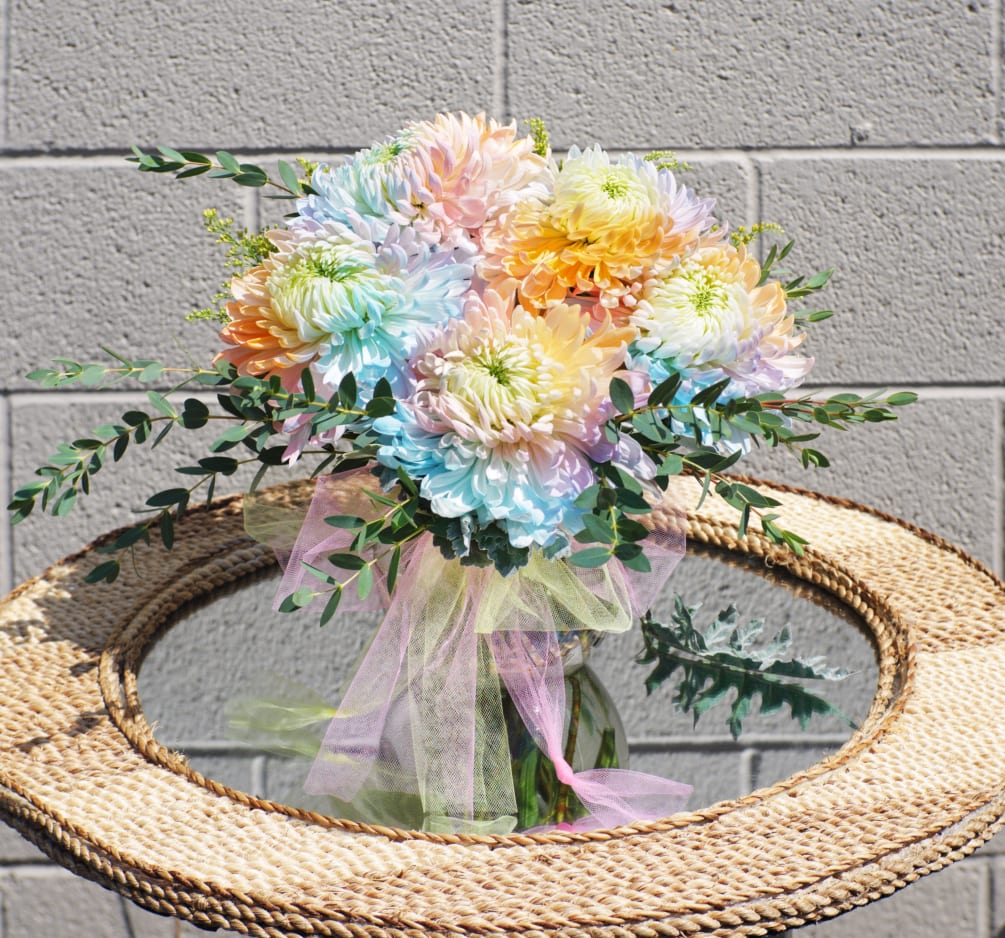 Sweet like a candy, this design including rainbow blooms and nice accents