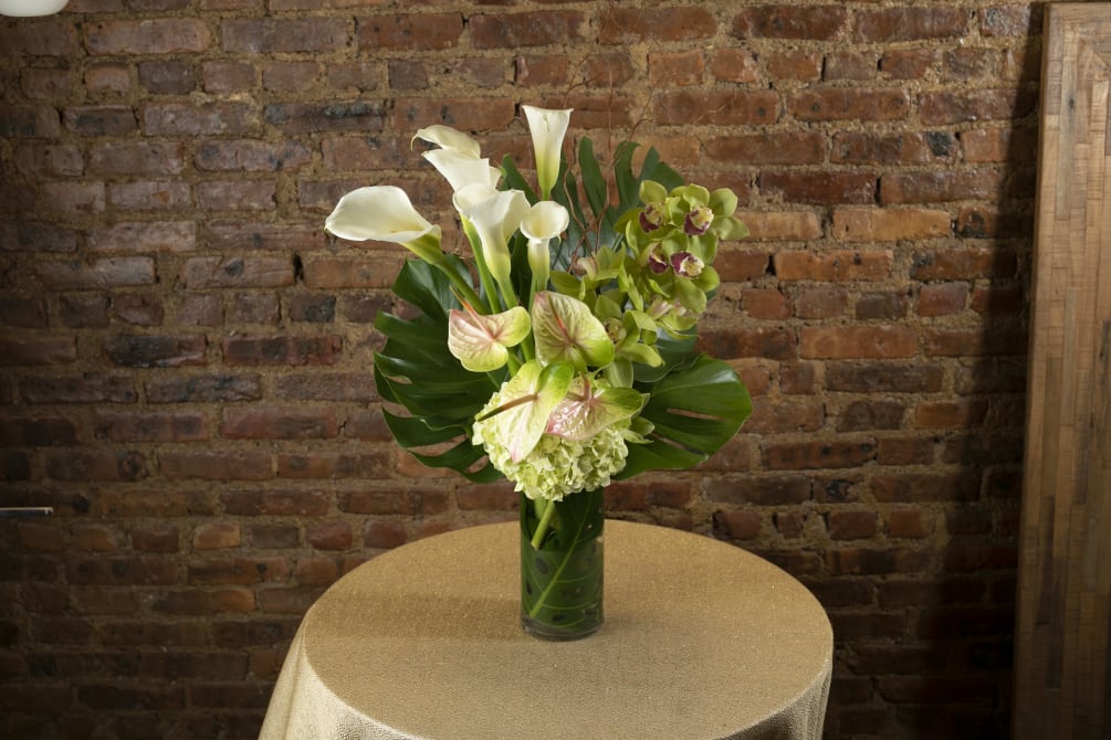 A gorgeous display decadent White Calla Lillie&#039;s, Green Cymbidium Orchids, Anthriums and