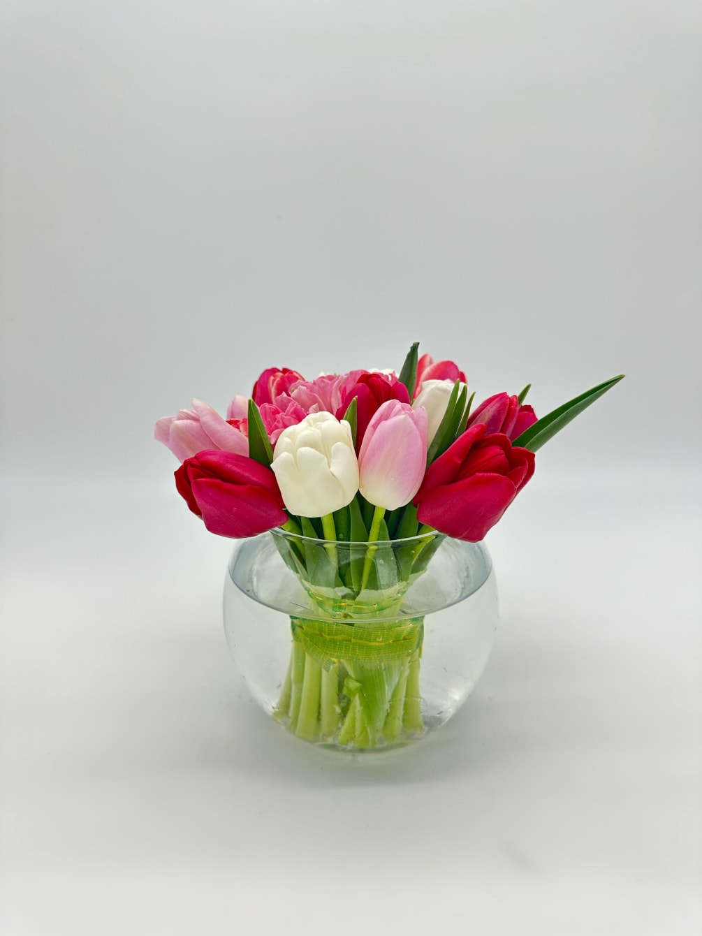 Assorted Tulips in a fish bowl