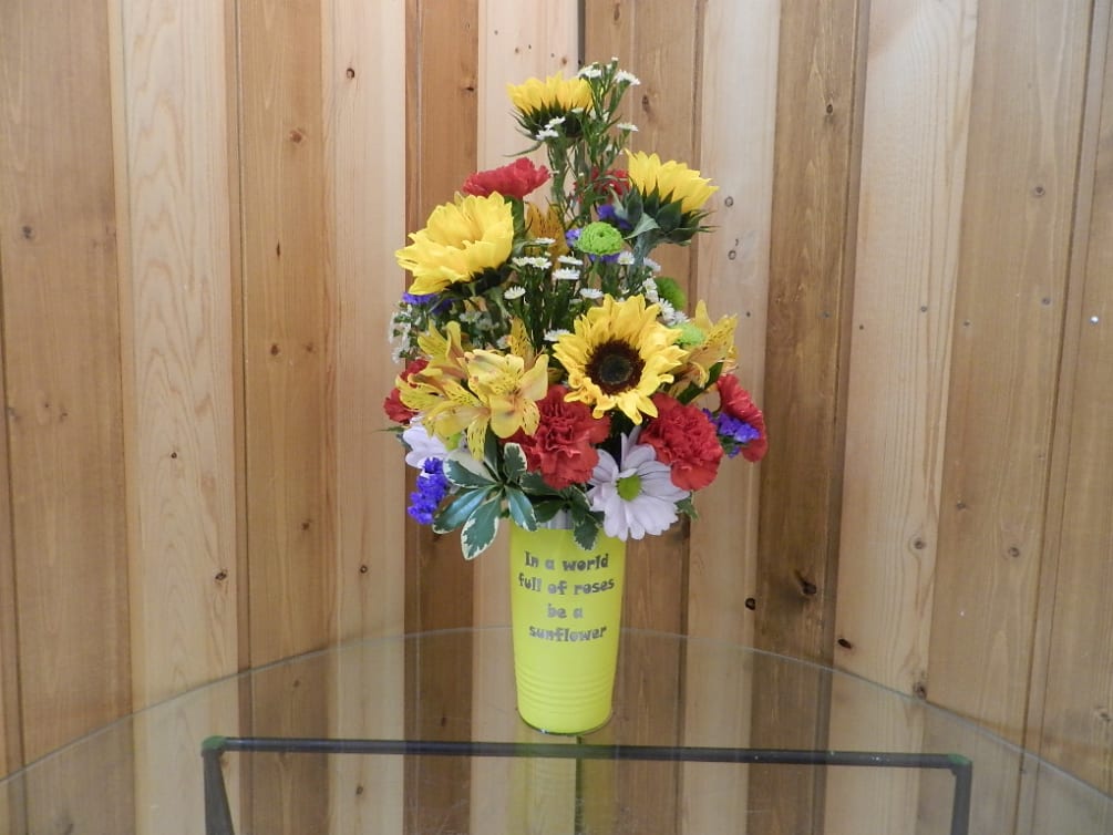 This beautiful summery bouquet arrives in an engraved stainless steel tumbler engraved