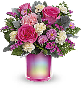 BRIGHT PINK AND CREME FLOWERS IN A COLORFUL RAINBOW CYLINDER VASE