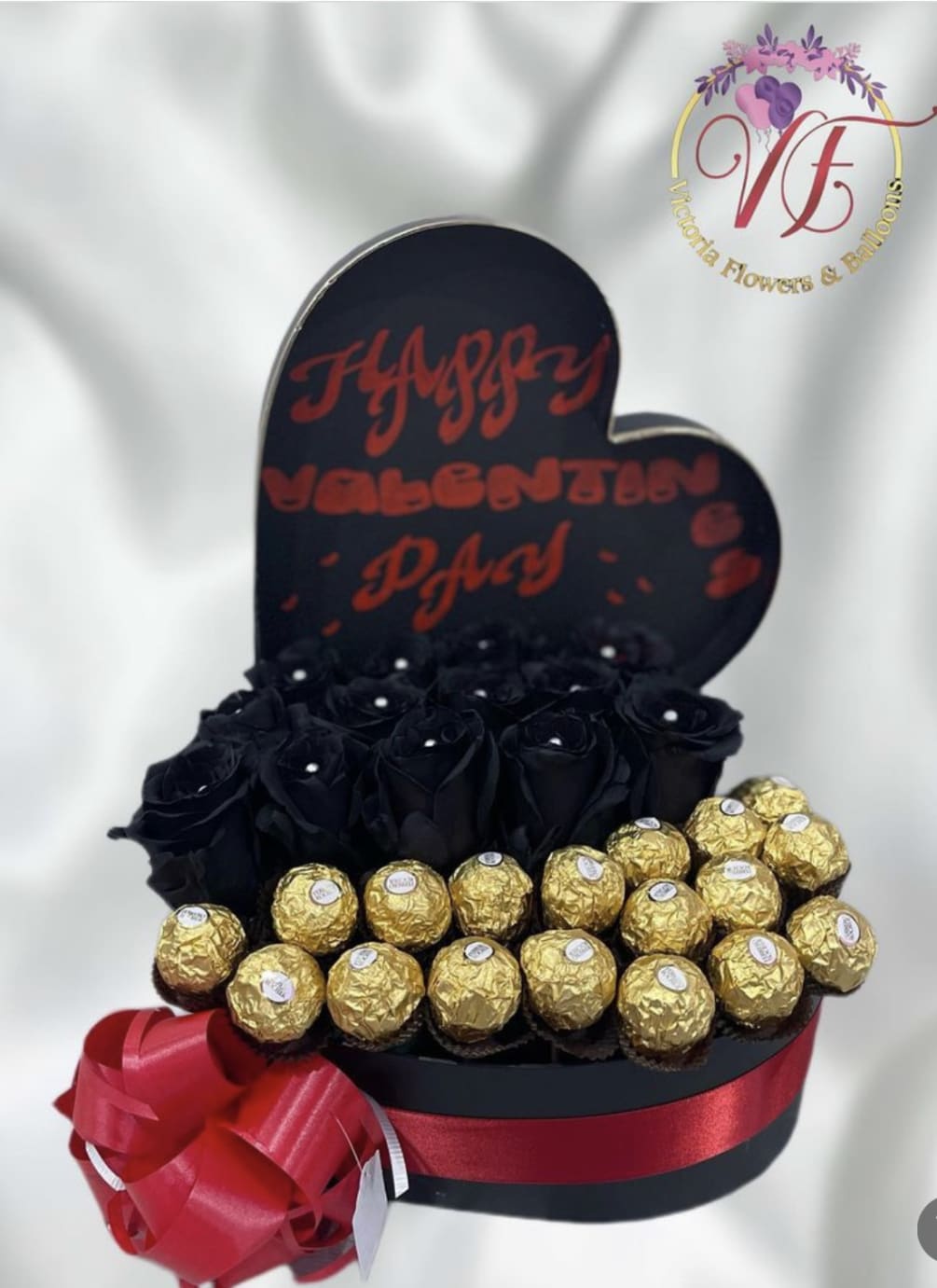 Ferrero Chocolates, cut roses (color of your preference) in a heart shaped
