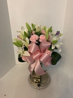 White lilies and pink carnations, aspidistra, alstromeria
