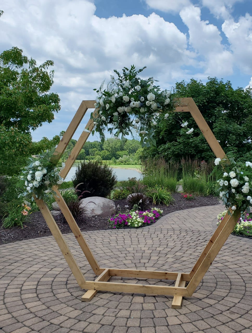 This Arch was made with a mixture of greens and white flowers