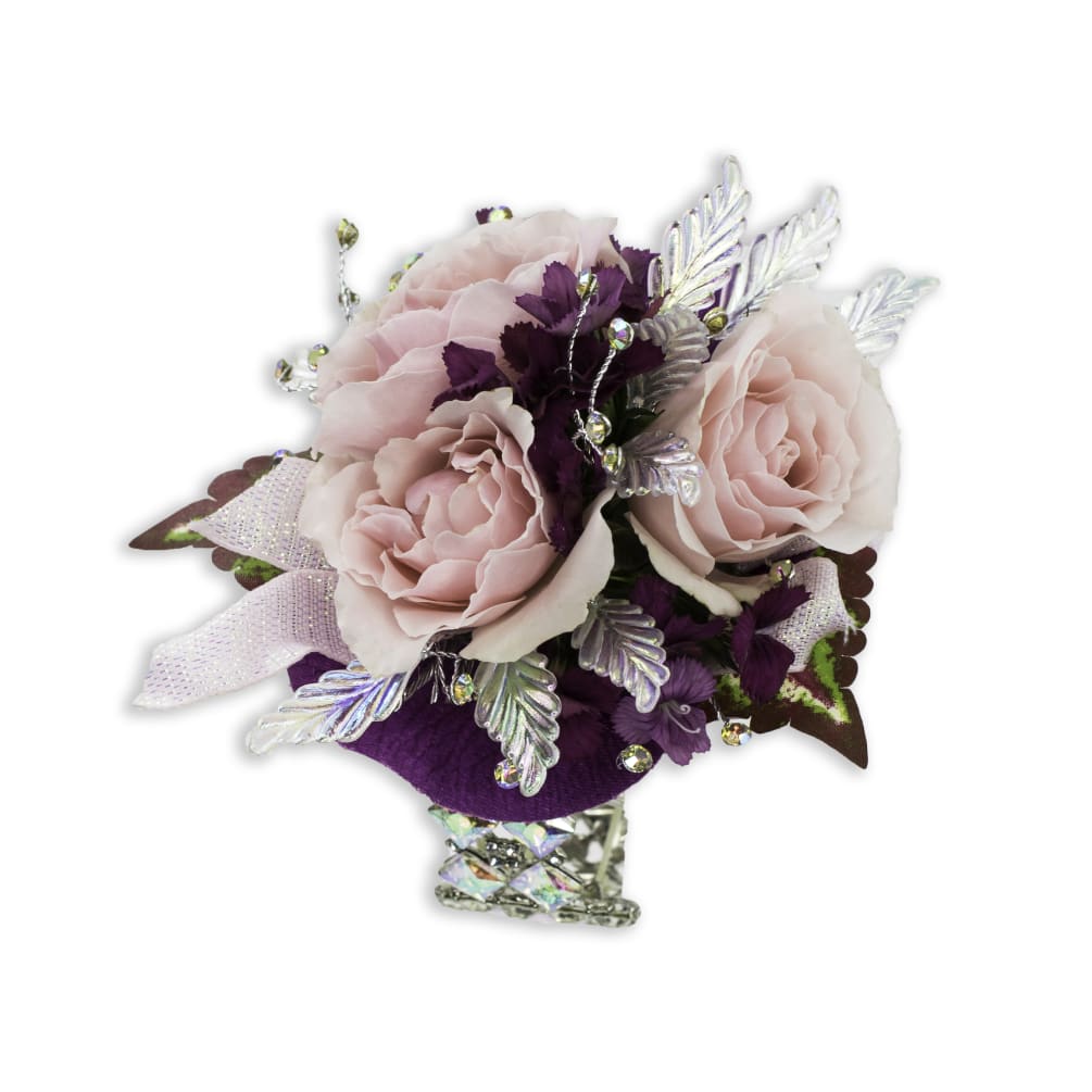 Soft pink roses, iridescent leaves and rhinestones combine with deep purple blooms