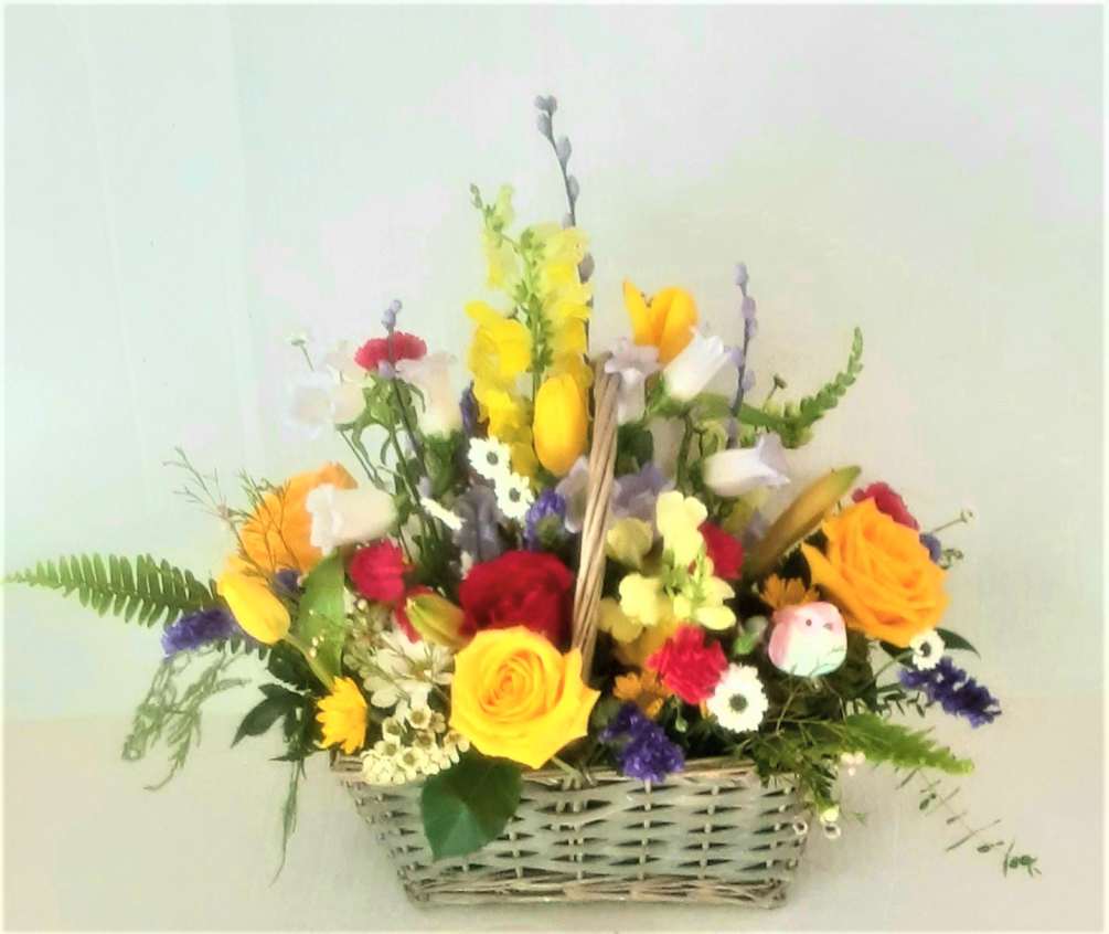 A large mix of spring flowers, tulips, daisies, lilies, roses and so