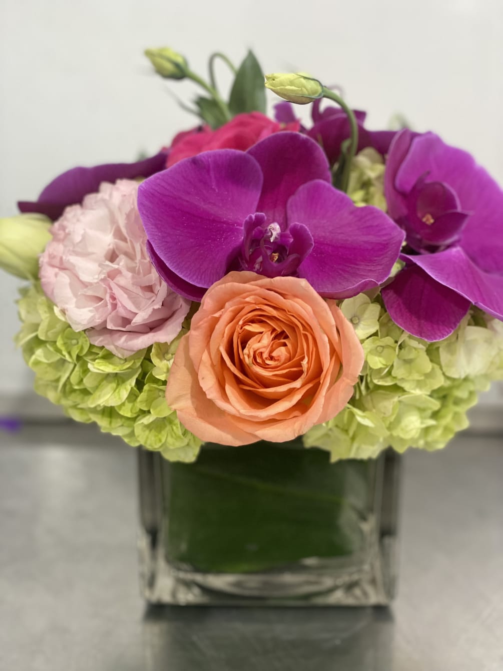 Stunning floral for Orchids Roses Hydrangeas 