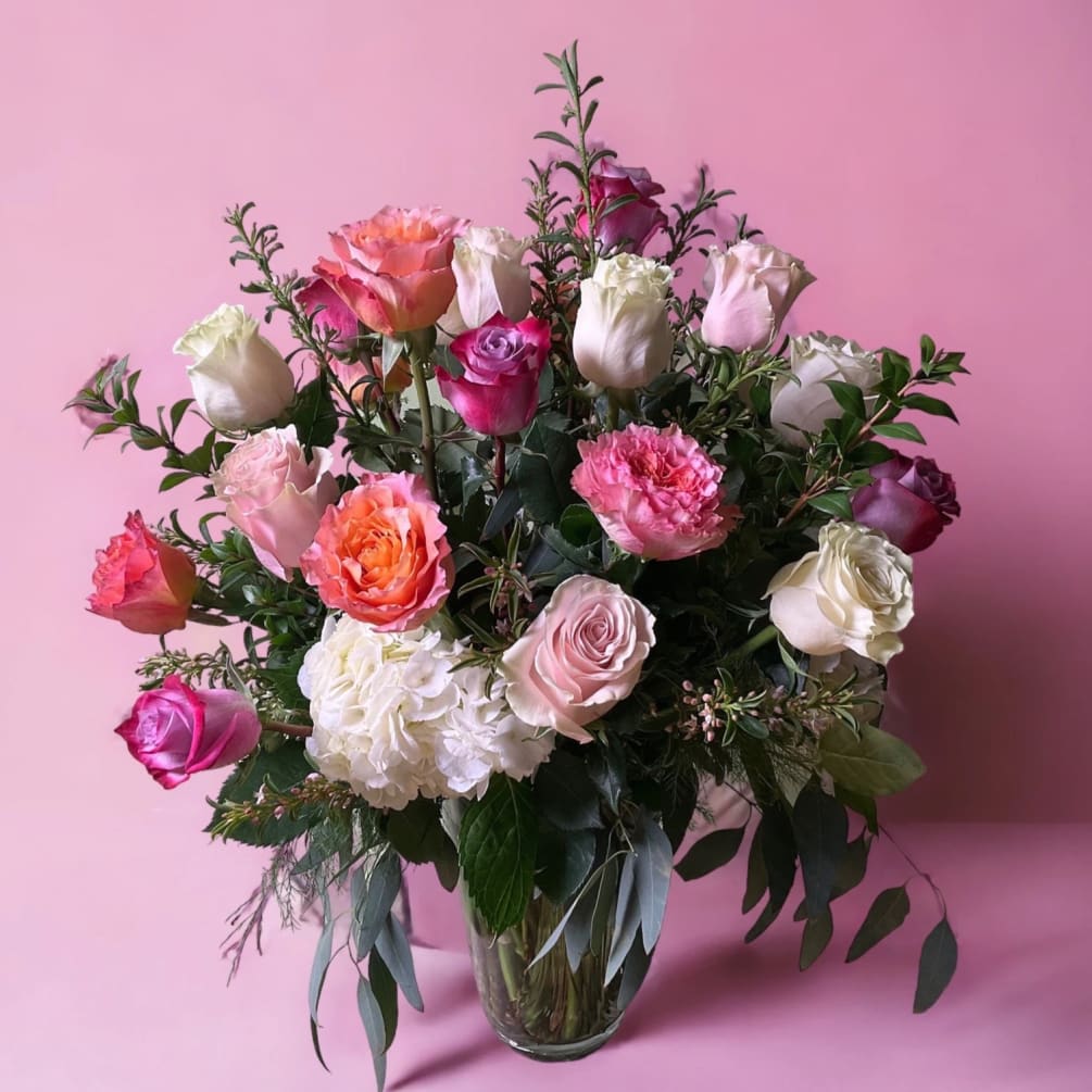 A glorious mix of roses, hydrangea and other seasonal beauties. 