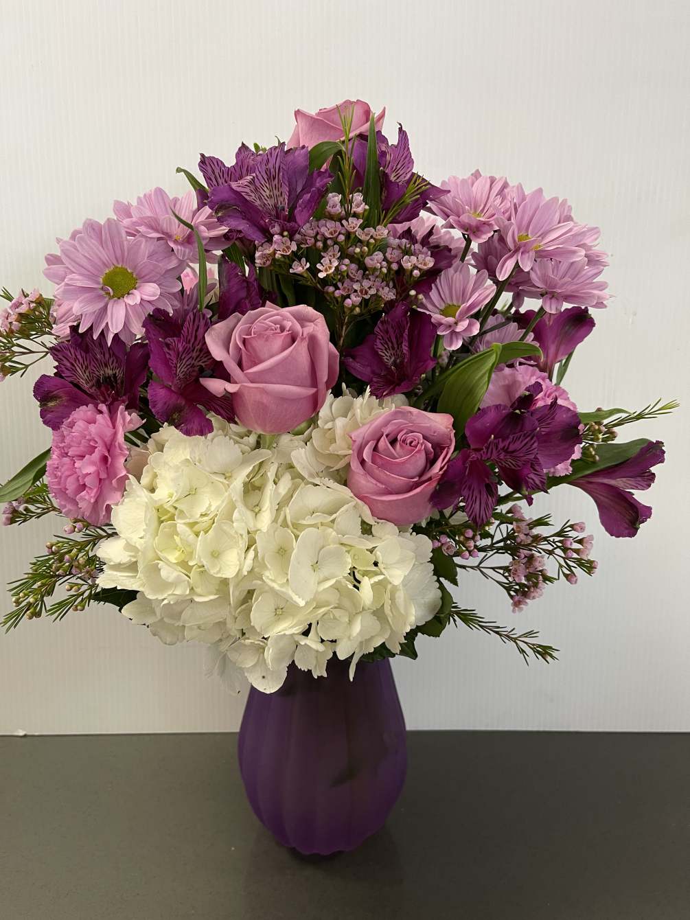 Frosted Lavender or Pink vase with Lavender and purple Flowers, 
Hydranges, roses