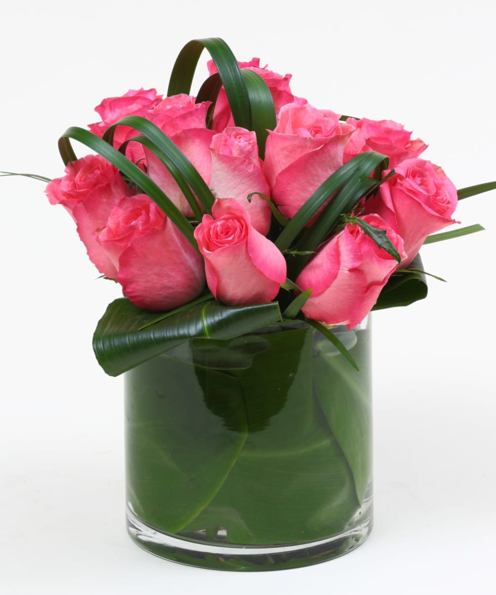 Ribbons of greenery make this offering of roses extra special.  