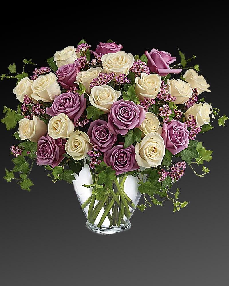 Two doz. long stem white and purple roses. 