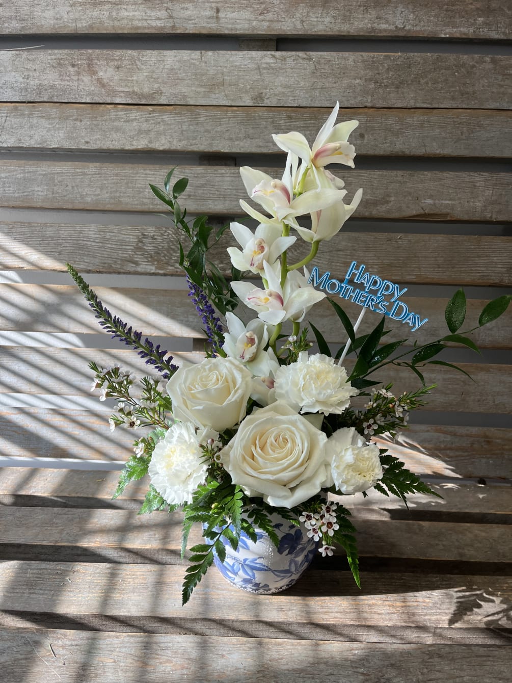 Mother’s Day orchid arrangement by Media Florist